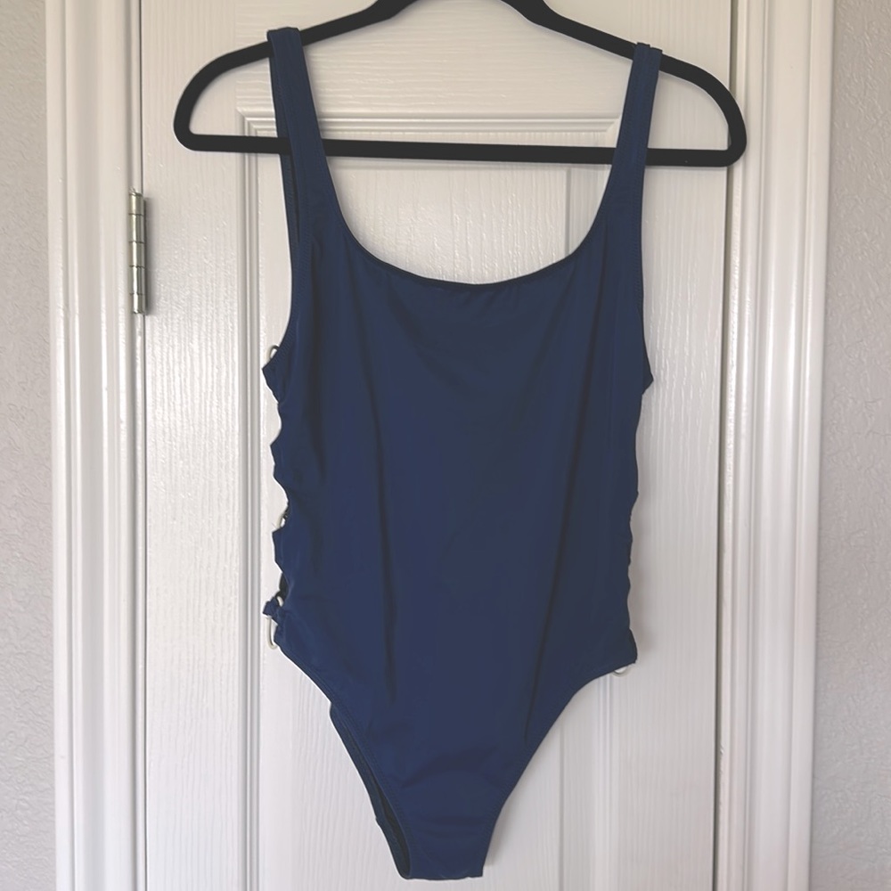 Solid and Striped Navy O Ring Open Side One Piece